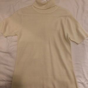 Creamy white short sleeve turtle neck.